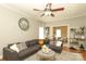 Comfortable living room featuring a large sectional sofa and stylish decor at 3015 Rochester Ct, Monroe, NC 28110