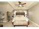 Relaxing primary bedroom with large bed, sitting area and soft lighting at 3015 Rochester Ct, Monroe, NC 28110