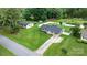 Overhead view showcasing the house, long driveway, and landscaped lawn at 3545 Yorkland Dr, Hickory, NC 28601