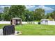 Manicured backyard featuring a storage shed and gazebo at 3545 Yorkland Dr, Hickory, NC 28601