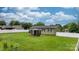 Backyard showcasing a charming gazebo, green lawn, and privacy fence at 3545 Yorkland Dr, Hickory, NC 28601