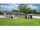 The back of the home offers an outdoor patio area and a shady backyard gazebo at 3545 Yorkland Dr, Hickory, NC 28601