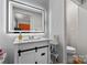 Updated bathroom with a new vanity, white cabinets, quartz counters, and a lighted mirror at 3545 Yorkland Dr, Hickory, NC 28601