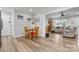Dining area with a wooden table and chairs, neutral walls, and an open view of the living room at 3545 Yorkland Dr, Hickory, NC 28601