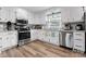 Well-maintained kitchen with white cabinets, stainless steel appliances and granite countertops at 3545 Yorkland Dr, Hickory, NC 28601