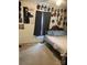 Cozy bedroom featuring a bed, a window with curtains, carpet, and a ceiling fan at 3810 Spike Ln, Vale, NC 28168