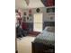 Bedroom featuring a bed, a window with blinds, carpet, and art on the walls at 3810 Spike Ln, Vale, NC 28168