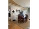 Dining room featuring a wooden table with chairs, hardwood floors, and modern decor at 3810 Spike Ln, Vale, NC 28168