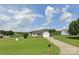 Charming single-story home with a long driveway, spacious front yard, and a covered front porch at 3810 Spike Ln, Vale, NC 28168
