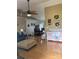 Open-concept living room connected to dining area, featuring hardwood floors and neutral decor at 3810 Spike Ln, Vale, NC 28168
