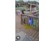 Outdoor bar and deck with covered seating area, bar stools, and patriotic decor at 3810 Spike Ln, Vale, NC 28168