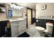 Bathroom featuring a modern vanity and black and white tile at 402 Madison St, Lincolnton, NC 28092