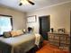 Bedroom featuring wooden floors and a ceiling fan at 402 Madison St, Lincolnton, NC 28092
