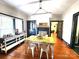 Cozy dining room with a wood table, modern chandelier, and natural light at 402 Madison St, Lincolnton, NC 28092