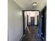 Hallway with dark-painted trim and a tile floor at 402 Madison St, Lincolnton, NC 28092