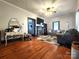 Inviting living room with hardwood floors, fireplace, and neutral tones at 402 Madison St, Lincolnton, NC 28092