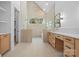 Modern bathroom with shower, tub, and vanity; natural stone accent wall adds texture and elegance at 4208 Antioch Church Rd # 1, Weddington, NC 28104