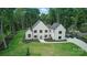 Stunning white modern home surrounded by lush greenery and landscaping at 4208 Antioch Church Rd # 1, Weddington, NC 28104