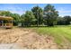 Expansive backyard featuring a small shed, covered porch, and light pole at 4351 Saluda Rd, Rock Hill, SC 29730