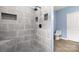 Newly tiled shower with built-in shampoo niches complemented by modern fixtures at 4351 Saluda Rd, Rock Hill, SC 29730