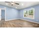 Bedroom with a ceiling fan, laminate flooring and windows at 4351 Saluda Rd, Rock Hill, SC 29730