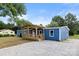 Charming blue home with a covered porch and gravel driveway at 4351 Saluda Rd, Rock Hill, SC 29730