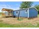 Exterior view of a charming blue house, complete with a covered porch at 4351 Saluda Rd, Rock Hill, SC 29730