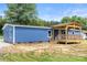 Charming blue house with a covered porch and natural wood accents at 4351 Saluda Rd, Rock Hill, SC 29730