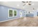 Living room with laminate flooring and windows at 4351 Saluda Rd, Rock Hill, SC 29730