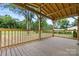 Wooden porch with a wooden railing looking out onto the yard at 4351 Saluda Rd, Rock Hill, SC 29730