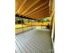 Covered back porch overlooks the fenced backyard at 5234 Bellflower Ln, Charlotte, NC 28227