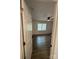 Cozy bedroom with a ceiling fan, wood-look flooring, and a bright window at 5234 Bellflower Ln, Charlotte, NC 28227