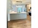 Bright kitchen with an island, stainless steel appliances, and modern lighting at 5234 Bellflower Ln, Charlotte, NC 28227