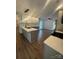 Modern kitchen featuring a central island, stainless appliances, and stylish pendant lighting at 5234 Bellflower Ln, Charlotte, NC 28227