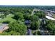 An elevated view of the home nestled among trees, showing proximity to the neighborhood at 704 N Main Ave, Newton, NC 28658