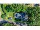 Aerial view of property highlighting its layout, landscaping, and surrounding neighborhood at 704 N Main Ave, Newton, NC 28658