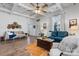 Comfortable living room featuring hardwood floors, stylish furniture, and unique ceiling design at 704 N Main Ave, Newton, NC 28658