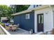 Cozy outdoor patio with a table and chairs, ideal for relaxation and outdoor dining at 704 N Main Ave, Newton, NC 28658