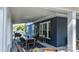 Inviting porch with an outdoor dining area, comfortable seating, and stylish decor perfect for entertaining at 704 N Main Ave, Newton, NC 28658