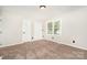 Bedroom featuring bright walls, natural light, and closet space at 7154 Woodcock Trl, Stanley, NC 28164