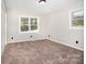 Bedroom featuring natural light, closet, and neutral walls at 7154 Woodcock Trl, Stanley, NC 28164