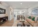 Bright living room with hardwood floors, comfortable seating and artful wall decor at 7217 Hodges Meadow Ln, Charlotte, NC 28213