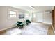 Finished basement space with seating and art at 80 Sumner Nw Ave, Concord, NC 28027