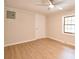 Bedroom with wood floors and natural light at 80 Sumner Nw Ave, Concord, NC 28027