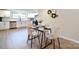 Dining room area features modern table set and kitchen with updated appliances at 80 Sumner Nw Ave, Concord, NC 28027