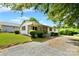 Quaint single-story home with wood accents, updated landscaping, and a gravel driveway at 80 Sumner Nw Ave, Concord, NC 28027
