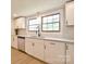 Beautiful kitchen features modern appliances, granite counters, and ample natural light at 80 Sumner Nw Ave, Concord, NC 28027