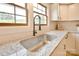 Kitchen sink features a modern fixture and granite countertops at 80 Sumner Nw Ave, Concord, NC 28027