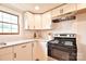 Kitchen features stainless steel appliances, white cabinetry, and granite countertops at 80 Sumner Nw Ave, Concord, NC 28027