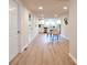 Bright living room with wood floors leads to a modern, updated kitchen at 80 Sumner Nw Ave, Concord, NC 28027